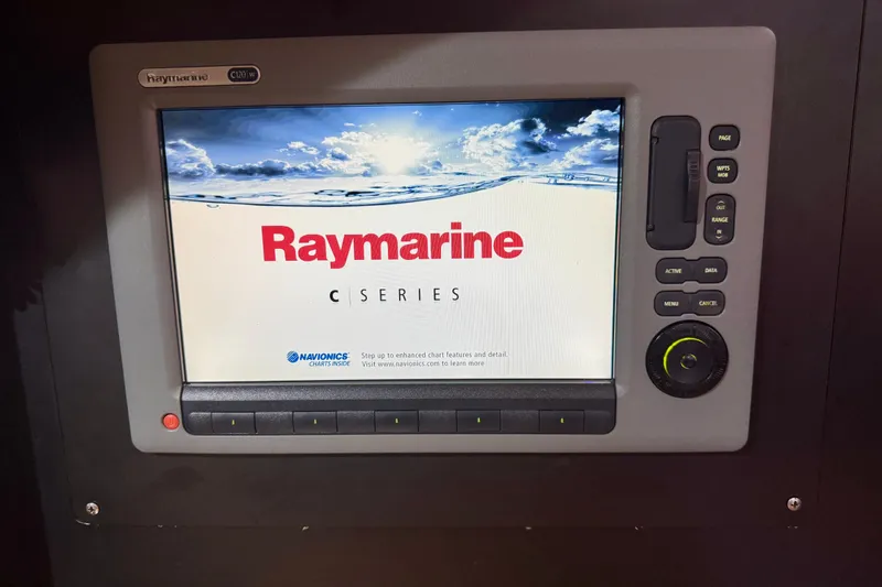 Slide: The Image of Raymarine C Series display on 2006 Island Packet 485 yacht, featuring navigation controls. - 46