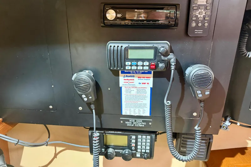 Slide: The Image of Control panel of a 2006 Island Packet 485 yacht with communication equipment. - 49
