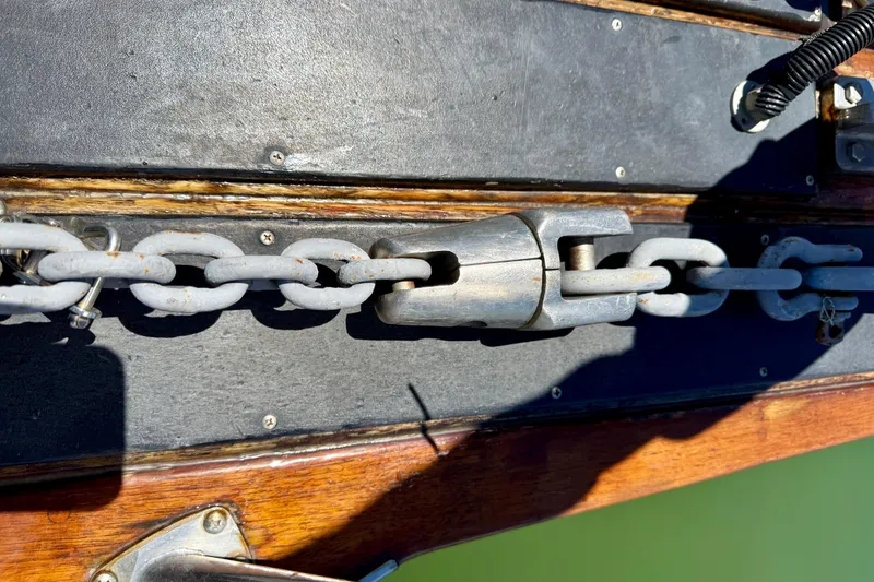 Slide: The Image of Close-up of anchor chain mechanism on 2003 Island Packet 485 sailboat deck. - 65