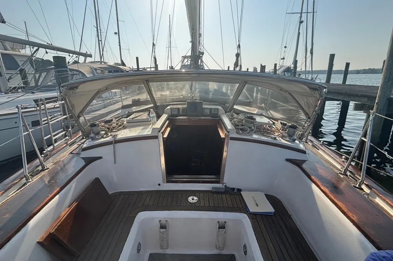 Slide: The Image of Cockpit view of 1988 Tayana 52 sailboat docked at marina. - 32
