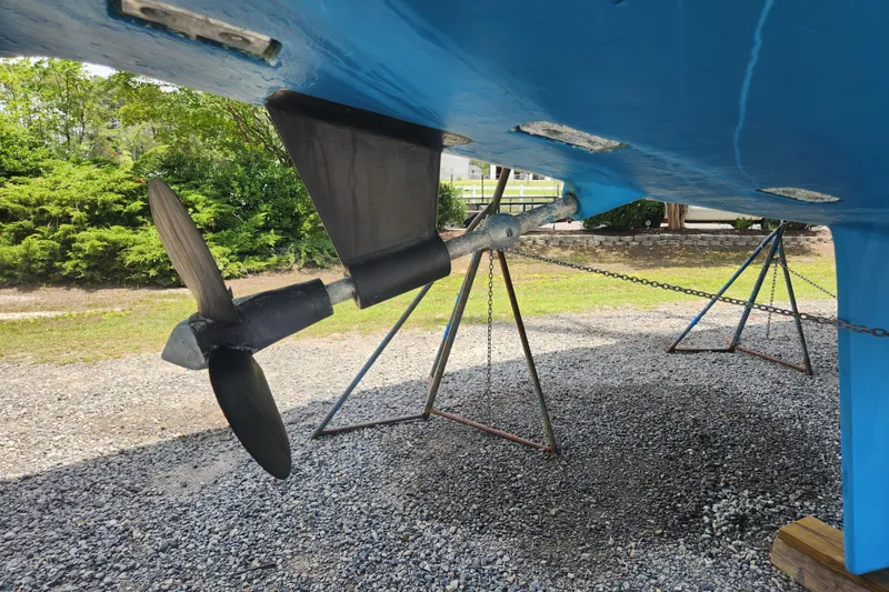 Slide: The Image of Propeller and rudder of 1988 Tayana 52 sailboat on dry dock. - 7
