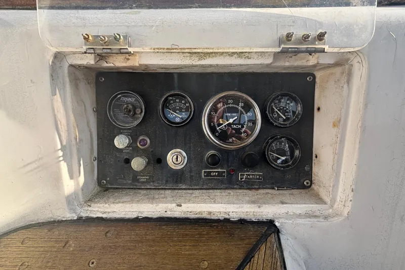 Slide: The Image of Control panel of a 1988 Tayana 52 sailboat with gauges and switches. - 29