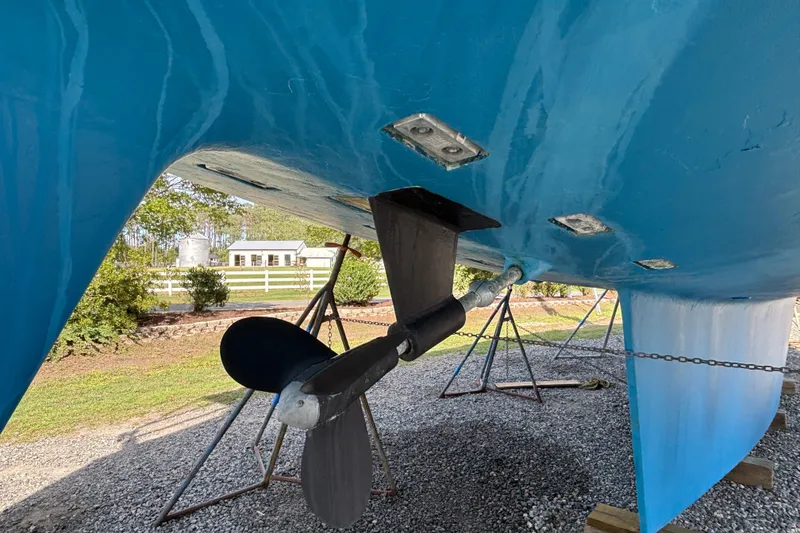 Slide: The Image of Underwater view of 1988 Tayana 52 sailboat hull and propeller on stands. - 18