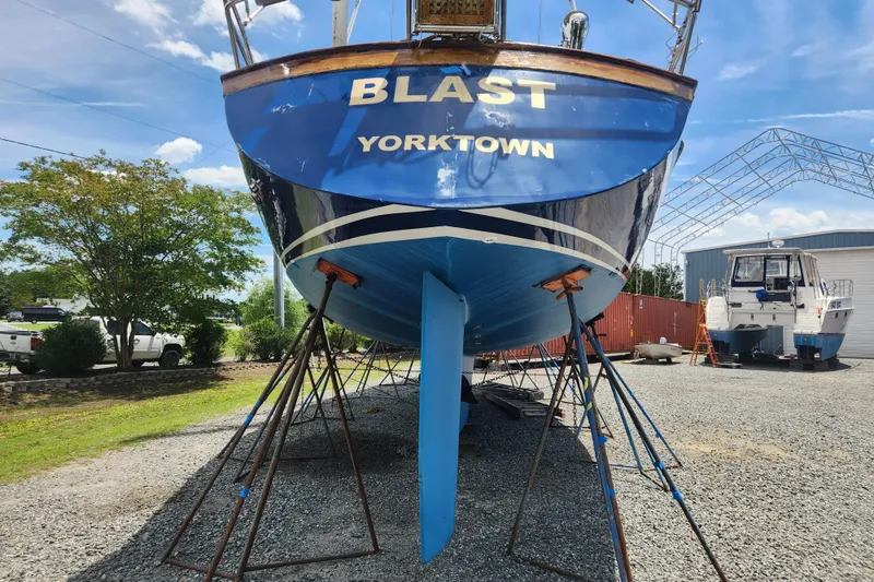 Slide: The Image of 1988 Tayana 52 sailboat "Blast" on stands in a boatyard, Yorktown. - 8