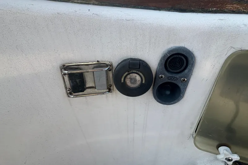 Slide: The Image of Control panel on 1988 Tayana 52 yacht featuring Lewmar and Hood components. - 30