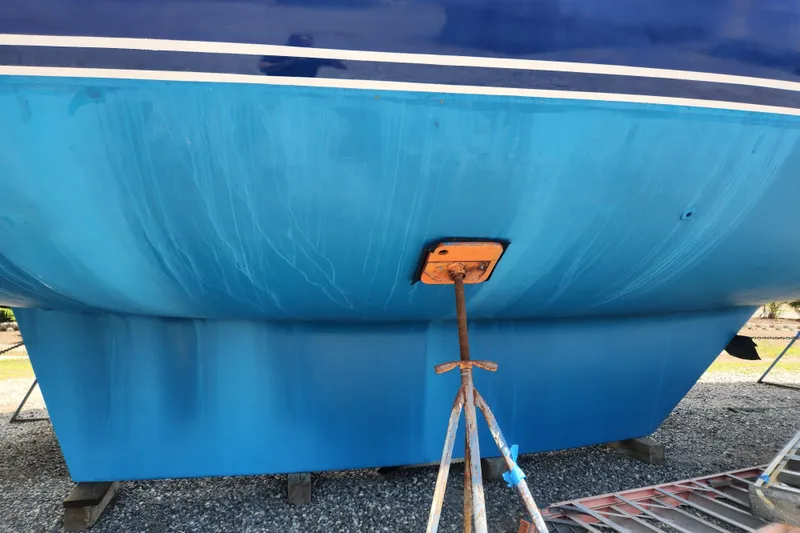 Slide: The Image of Bottom view of a 1988 Tayana 52 sailboat hull on dry dock. - 5