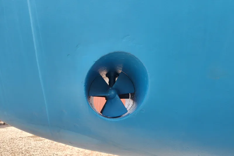 Slide: The Image of Close-up of a blue Tayana 52 boat propeller, 1988 model. - 4