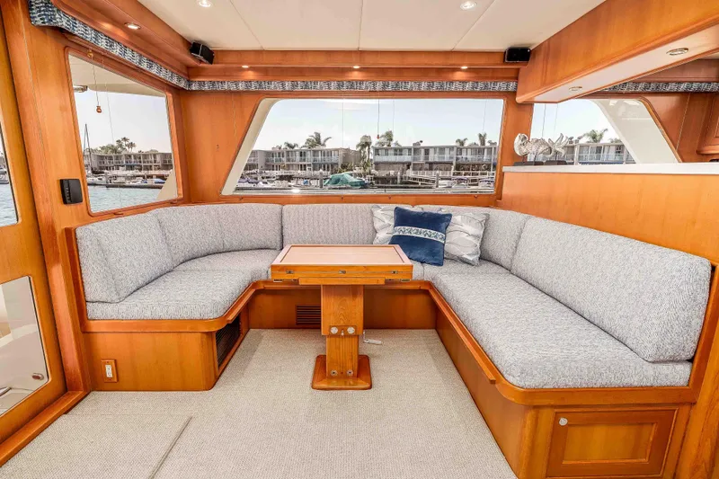 Slide: The Image of Luxurious interior of 2005 Offshore Yachts 54 Pilothouse with elegant seating and scenic window views. - 22