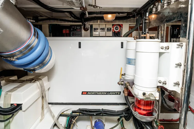 Slide: The Image of Engine room of 2005 Offshore Yachts 54 Pilothouse with Northern Lights generator. - 44