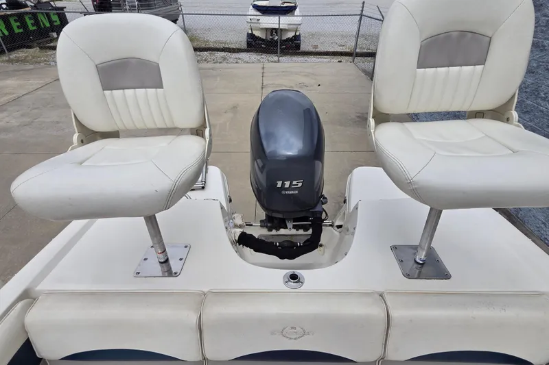 Slide: The Image of 2013 Stingray 191 LX boat with Yamaha 115 engine and dual white seats. - 10