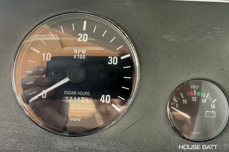 Slide: The Image of Close-up of Tiara Yachts 3500 Express 1998 dashboard gauges showing RPM and voltage. - 20