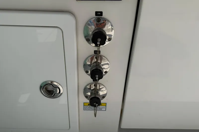Slide: The Image of Fuel inlets on a 2023 Regulator 37 boat, featuring secure caps and a sleek design. - 18