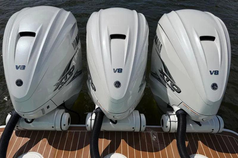 Slide: The Image of Triple Yamaha V8 outboard engines on a 2023 Regulator 37 boat. - 19
