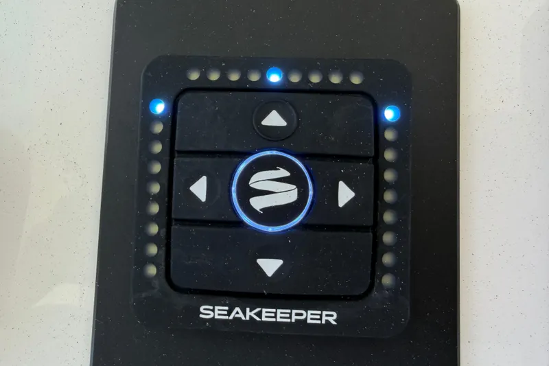 Slide: The Image of Control panel of a 2023 Regulator 37 boat featuring Seakeeper stabilization system. - 6