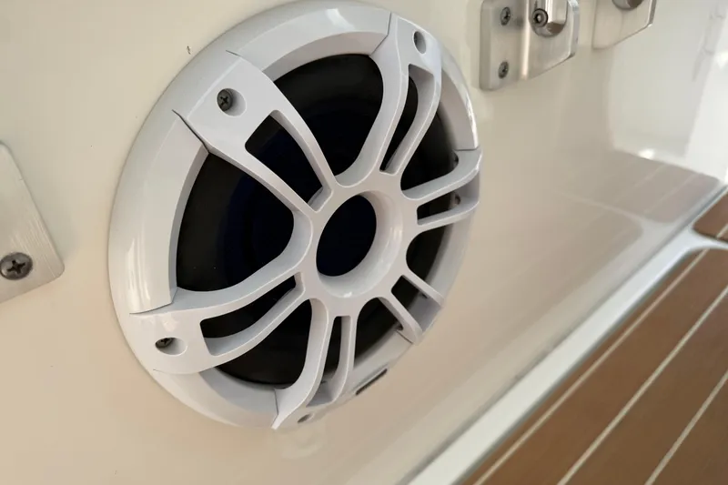 Slide: The Image of 2023 Regulator 37 boat speaker with white grille on deck. - 9