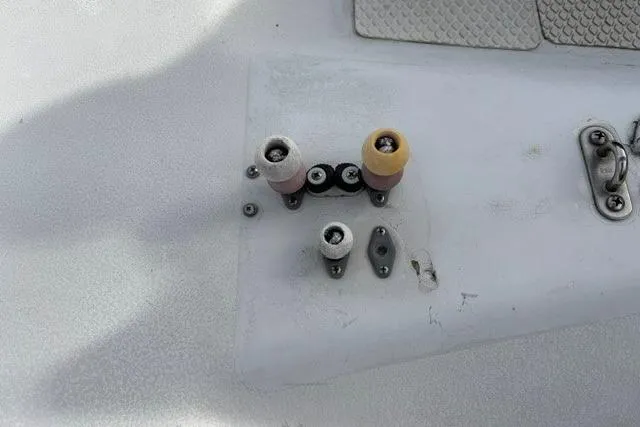 Slide: The Image of Close-up of Bravura B35 sailboat deck hardware, featuring cleats and fittings, 1999 model. - 10