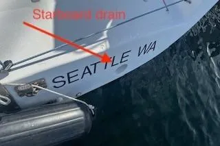 Slide: The Image of 1999 Bravura B35 boat with "Seattle WA" text and starboard drain label. - 12