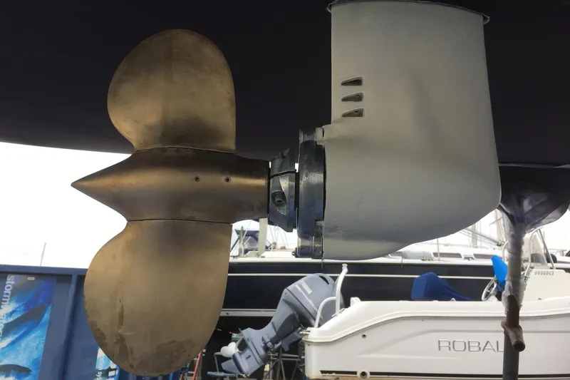 Slide: The Image of Close-up of a Bravura B35 1999 boat propeller and rudder in a marina setting. - 8