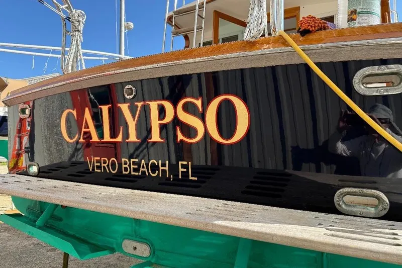 Slide: The Image of Stern of 1995 Wilbur Weekender boat "Calypso" in Vero Beach, FL. - 38