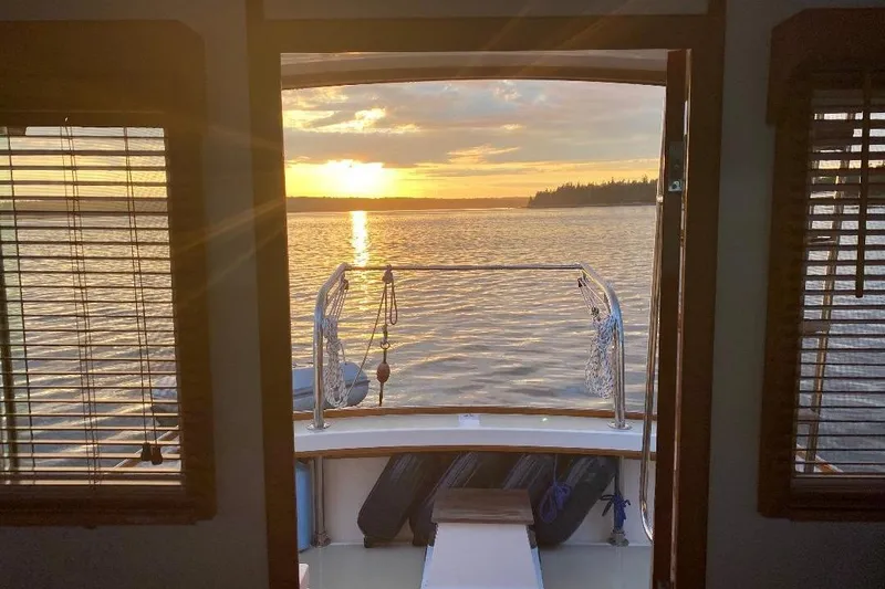 Slide: The Image of Sunset view from a 1995 Wilbur Flybridge Cruiser. - 4