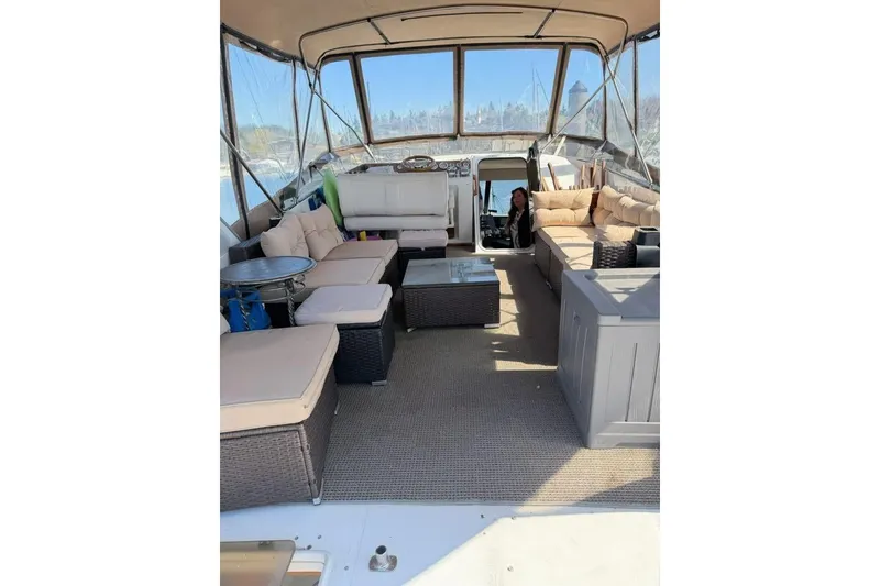 Slide: The Image of Spacious interior of 1993 Bayliner 4588 Pilothouse with comfortable seating and panoramic windows. - 25