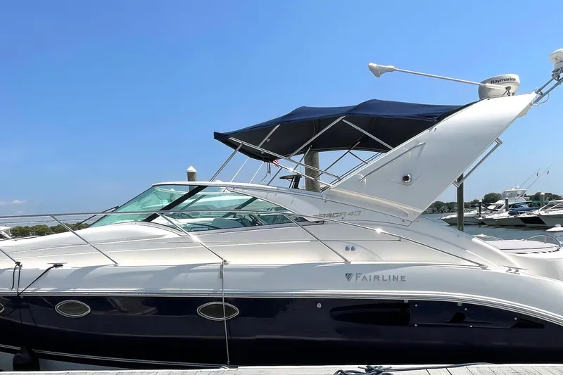 Slide: The Image of 2004 Fairline Targa 40 yacht docked under clear blue sky. - 13