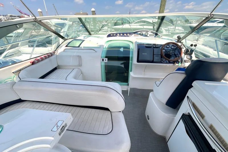 Slide: The Image of 2004 Fairline Targa 40 yacht interior with helm, seating, and dashboard. - 4