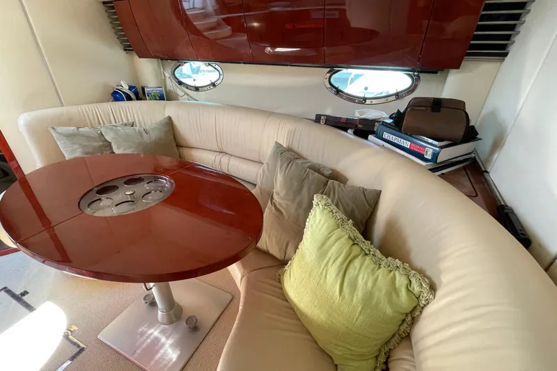Slide: The Image of Luxurious interior of 2004 Fairline Targa 40 yacht with plush seating and elegant table. - 9