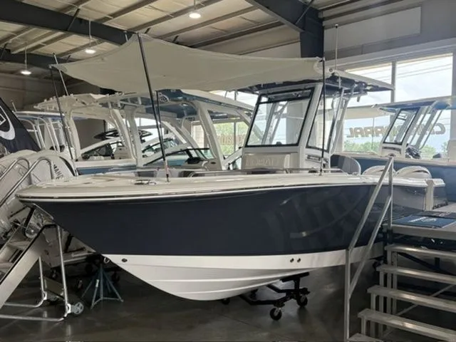 The Image of 2026 Robalo R250 Center Console boat in showroom. - 1