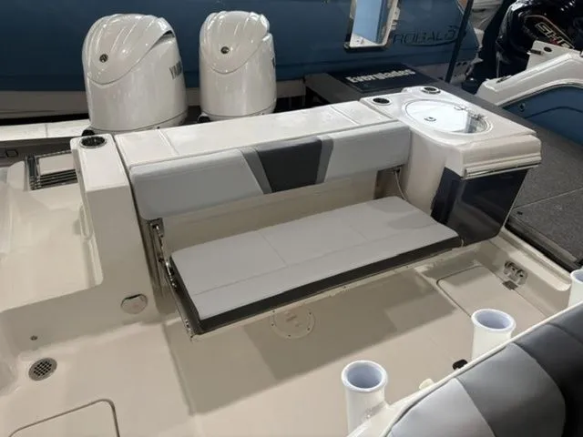 Slide: The Image of 2026 Robalo R250 Center Console with seating and engines. - 8