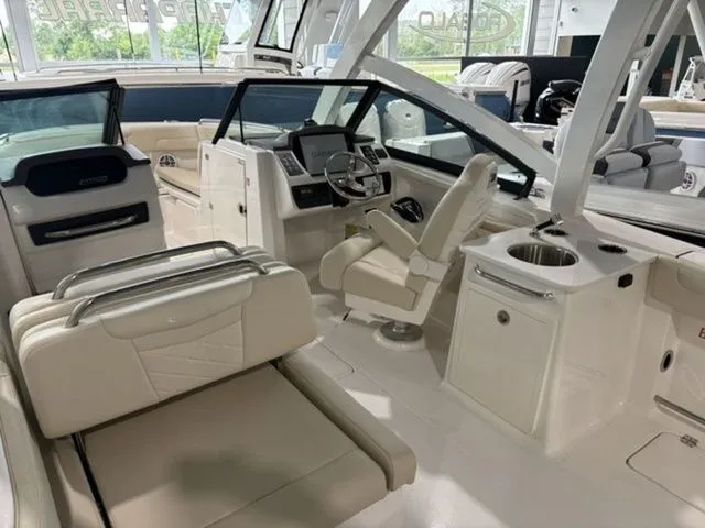 Slide: The Image of Interior view of 2026 Robalo R257 Dual Console boat. - 4