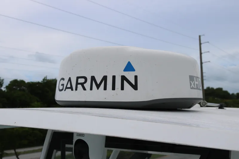 Slide: The Image of Garmin xHD radar on 2023 Sea Hunt Gamefish 25 boat, outdoor setting. - 11