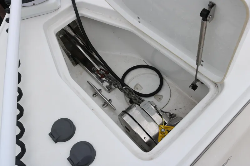 Slide: The Image of Anchor storage compartment on 2023 Sea Hunt Gamefish 25 boat. - 6