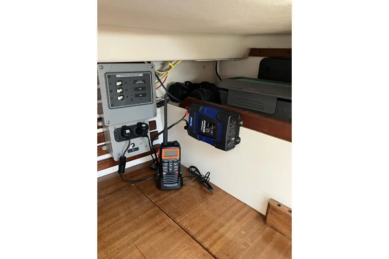Slide: The Image of Electrical panel and radio equipment inside a 1981 Pearson 365 Ketch sailboat. - 26