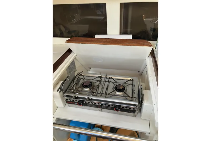 Slide: The Image of Two-burner stove in 1981 Pearson 365 Ketch yacht galley. - 28