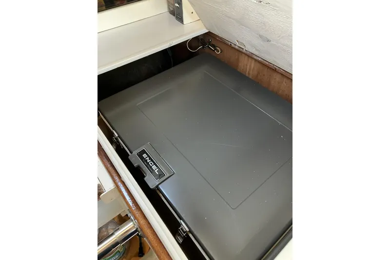 Slide: The Image of Engel cooler inside 1981 Pearson 365 Ketch sailboat storage compartment. - 35