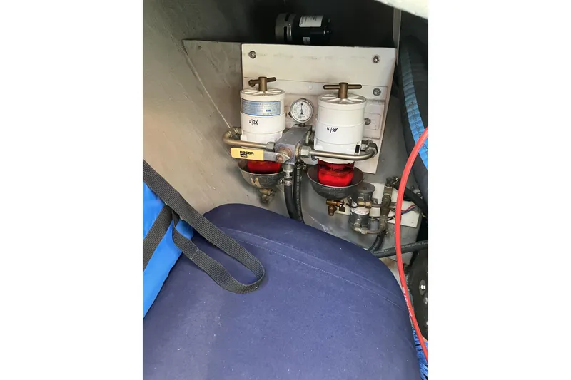 Slide: The Image of Engine compartment of 1981 Pearson 365 Ketch with fuel filters and gauge. - 37