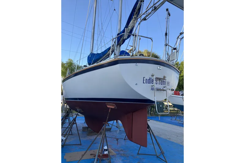 Slide: The Image of Pearson 365 Ketch sailboat from 1981 on stands, named "Endless Summer." - 45