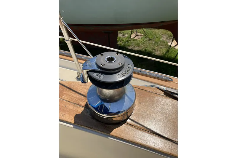 Slide: The Image of Winch on 1981 Pearson 365 Ketch sailboat deck, featuring Lewmar branding. - 6