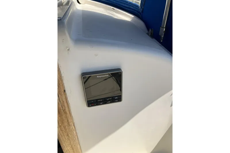 Slide: The Image of Raymarine device on 1981 Pearson 365 Ketch sailboat, mounted on white surface. - 8