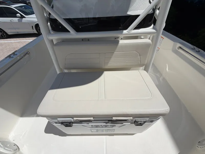 Slide: The Image of Bench seat with integrated storage on a boat, surrounded by white railing. - 29
