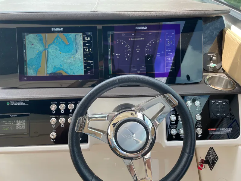 Slide: The Image of Sea Ray Sundancer 320 helm with Simrad displays. - 19