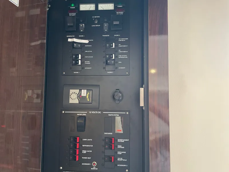 Slide: The Image of Electrical control panel of Sea Ray Sundancer 320 yacht, year 2020. - 23