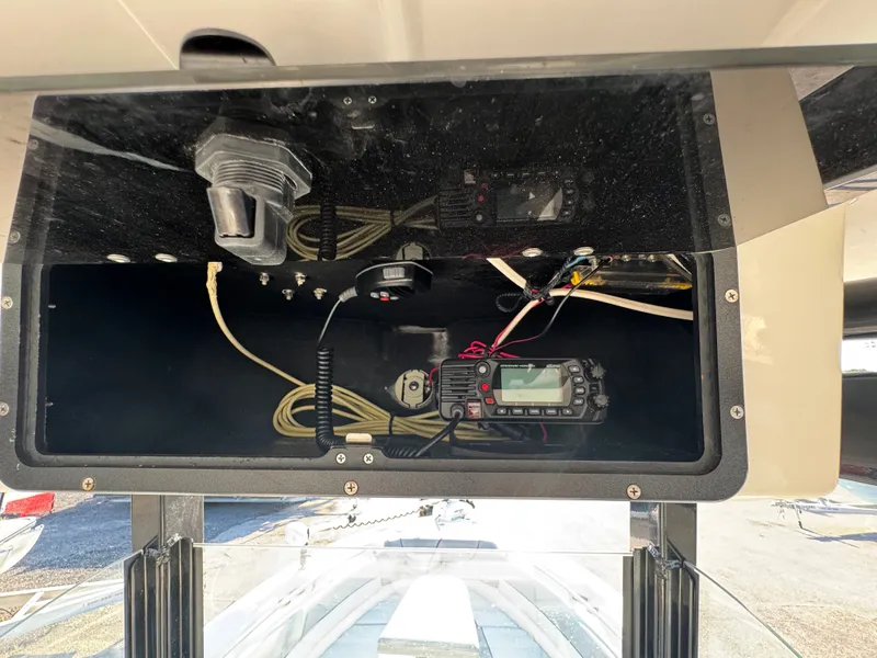Slide: The Image of Electronics compartment of a 2022 NauticStar 2602 Legacy boat. - 21