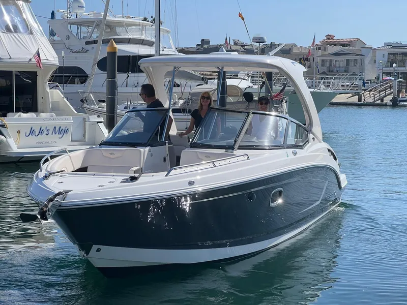 The Image of 2017 Chaparral 307 SSX boat in harbor, sunny day. - 0