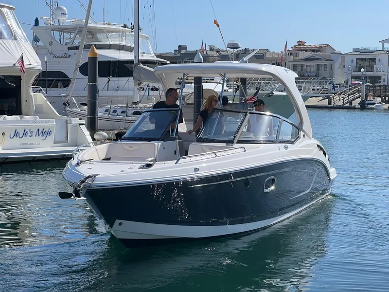Slide: The Image of 2017 Chaparral 307 SSX boat in harbor, sunny day. - 1