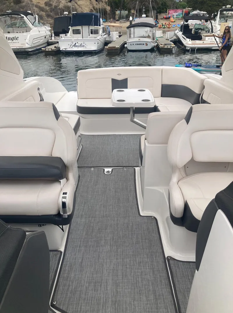 Slide: The Image of Interior of a 2017 Chaparral 307 SSX boat at the marina. - 13