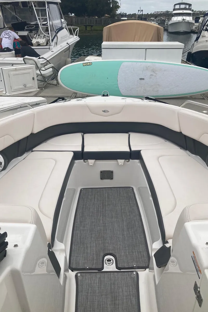 Slide: The Image of Interior of a 2017 Chaparral 307 SSX boat with paddleboard. - 15