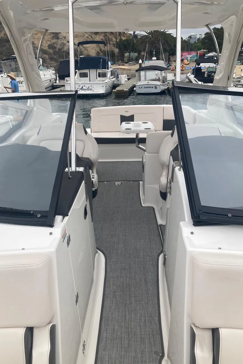 Slide: The Image of Interior of a 2017 Chaparral 307 SSX boat in harbor. - 16