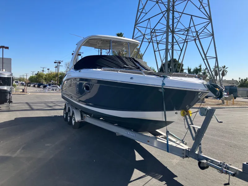 Slide: The Image of 2017 Chaparral 307 SSX boat on trailer outdoors. - 20